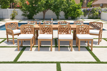11 pc Monterey Teak Dining Set with 120" Double Leaf Expansion Table. Sunbrella Cushion